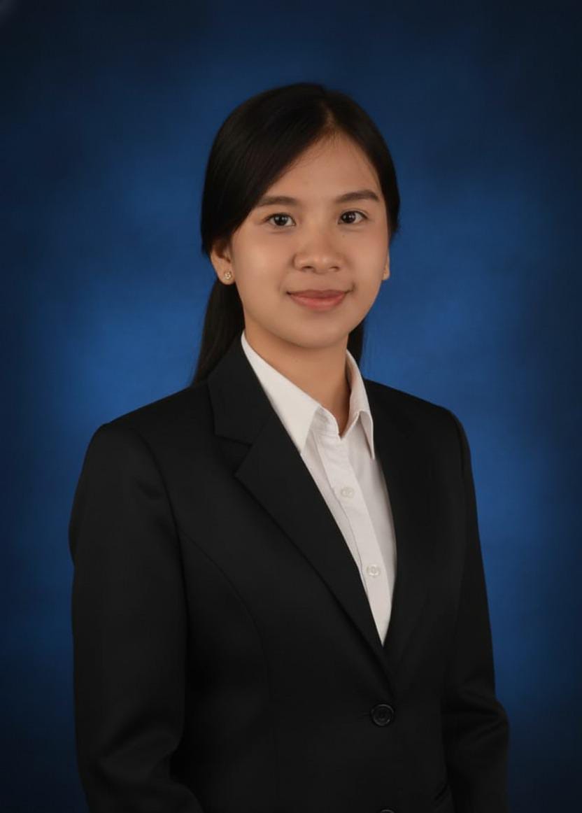 Professional portrait with blue background.